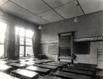 Een klaslokaal.
<br/>
Adrianus Meijer, Beeldbank Stadsarchief, ca 1932